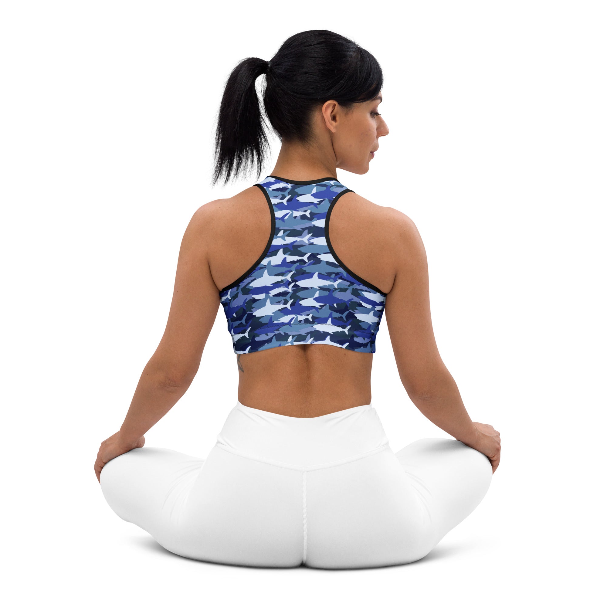 Women’s blue and white shark-patterned padded sports bra with black trim buttery soft supportive and quick-dry