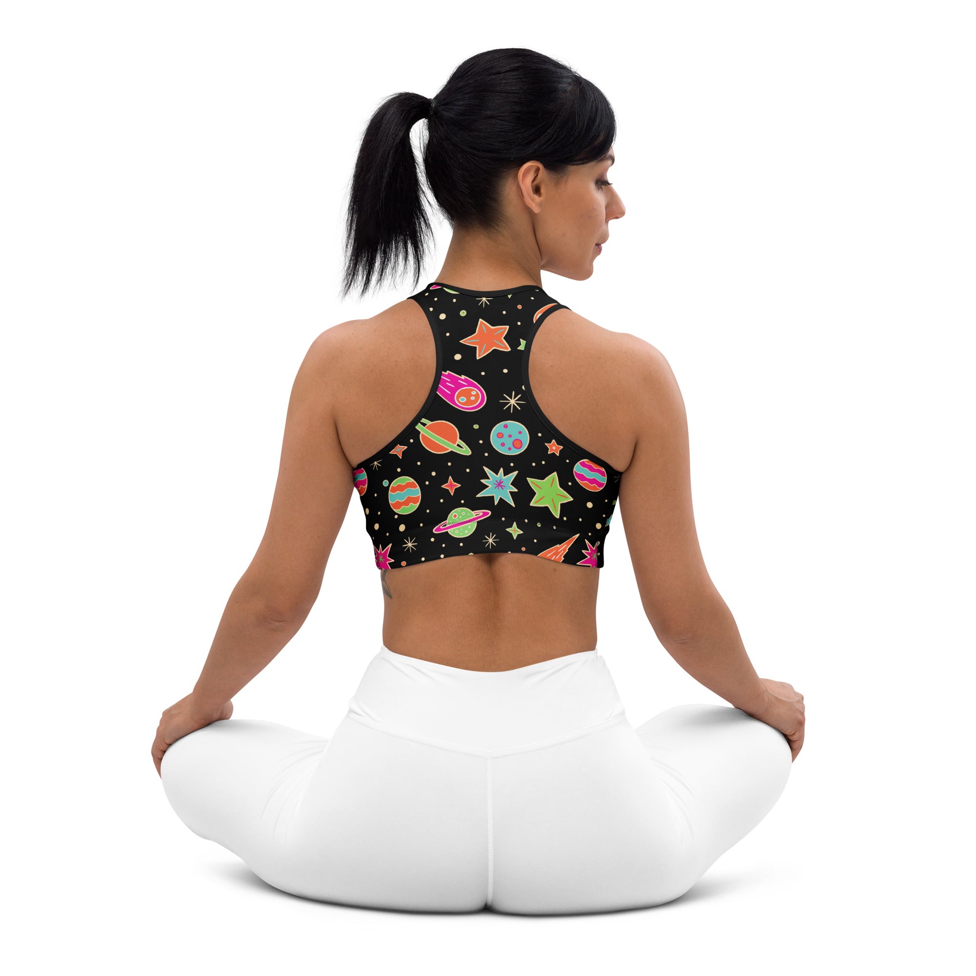 Women’s retro space padded sports bra in black with colorful planets stars and rockets buttery soft supportive quick dry