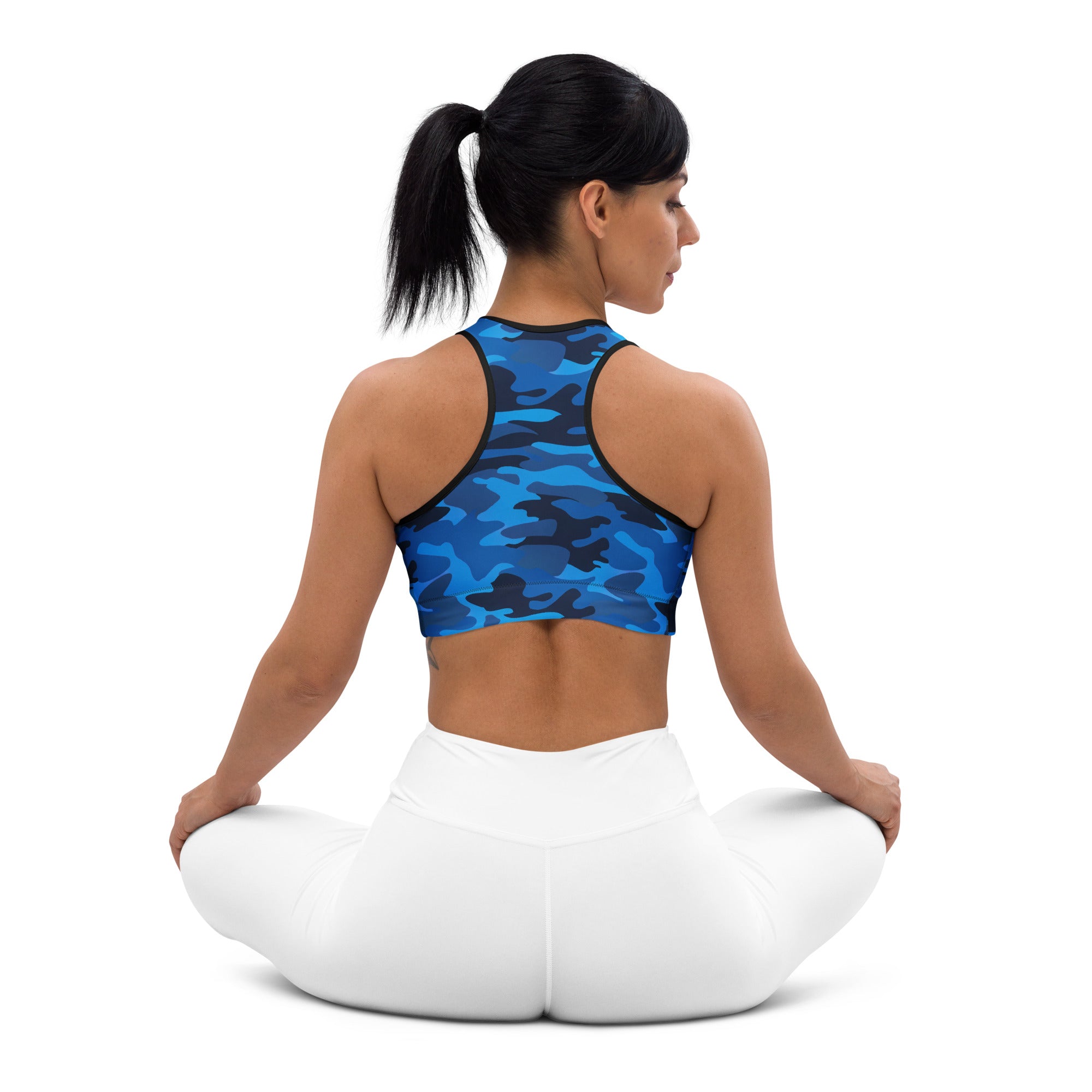 Women’s blue and black camouflage padded sports bra with black trim, buttery soft, supportive, and quick-dry fabric