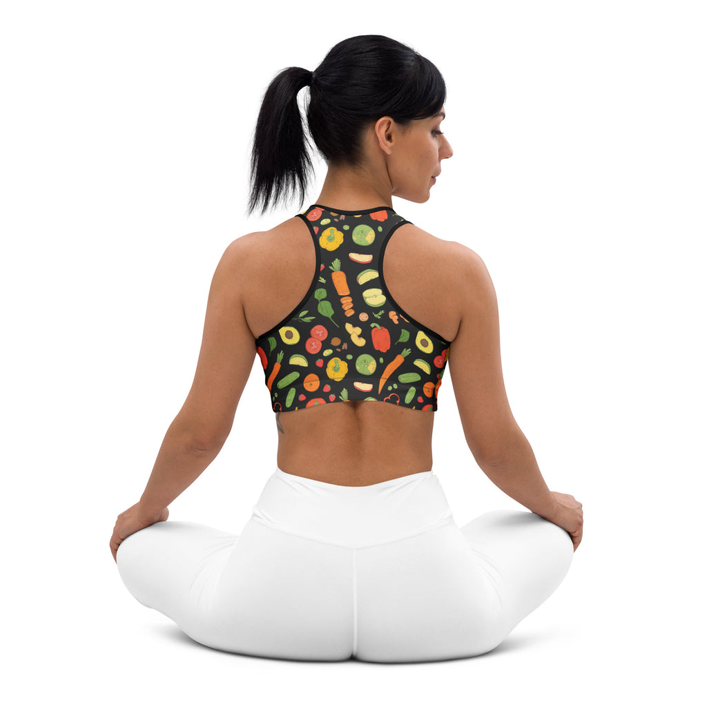 Women’s black padded sports bra with colorful veggie and fruit print on a dark background, buttery soft and quick-dry