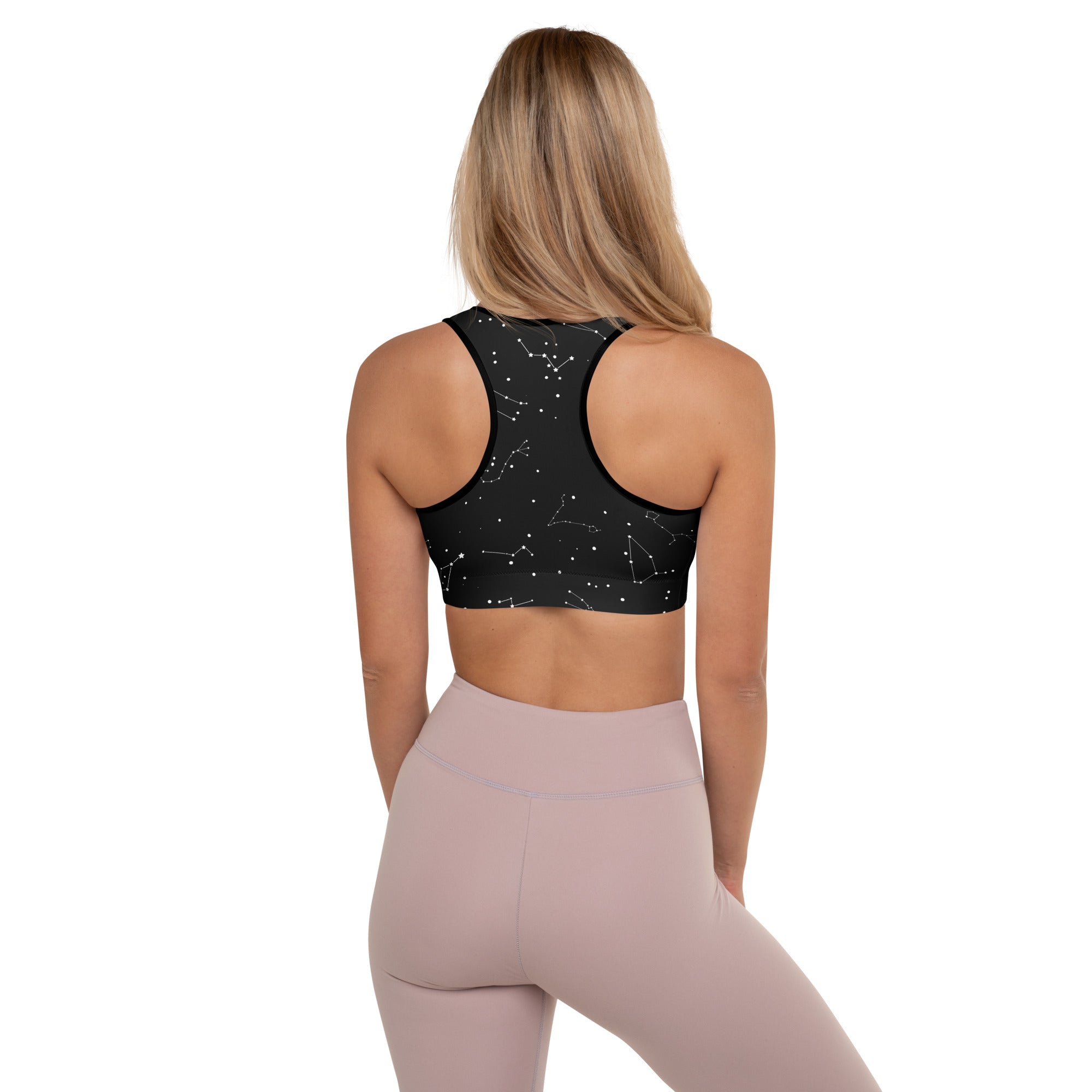 Black padded sports bra with white celestial constellation pattern buttery soft supportive and quick-dry