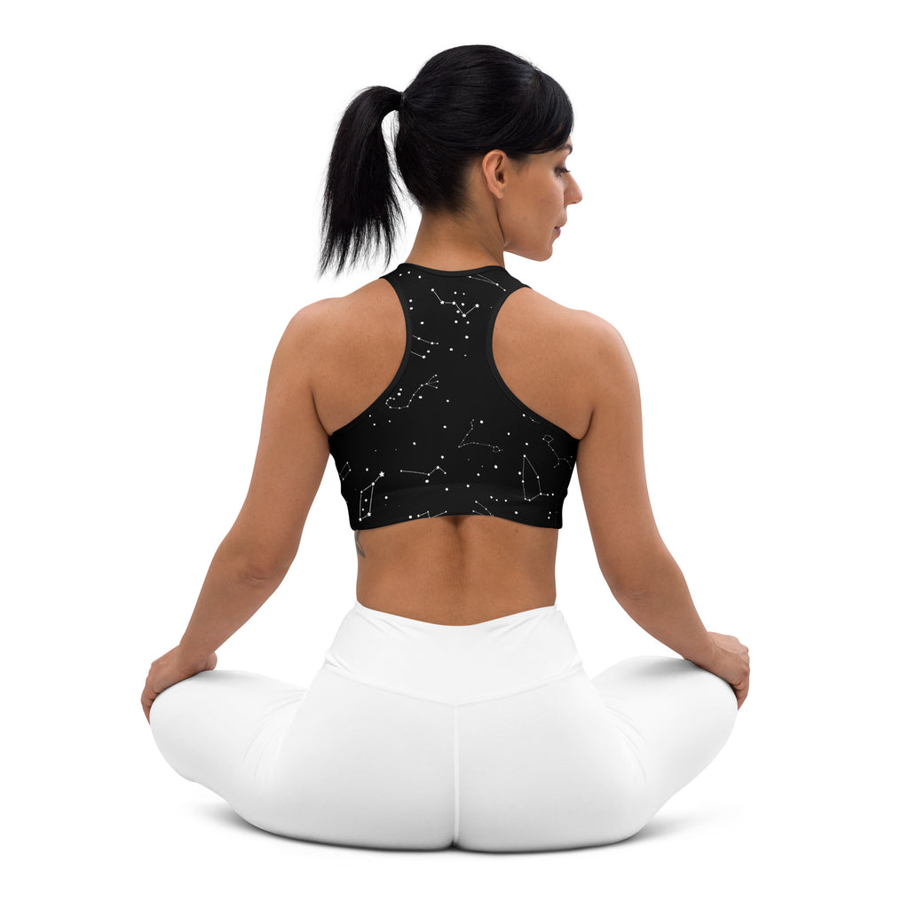 Black women’s padded sports bra with white realistic constellation patterns buttery soft supportive quick-dry material
