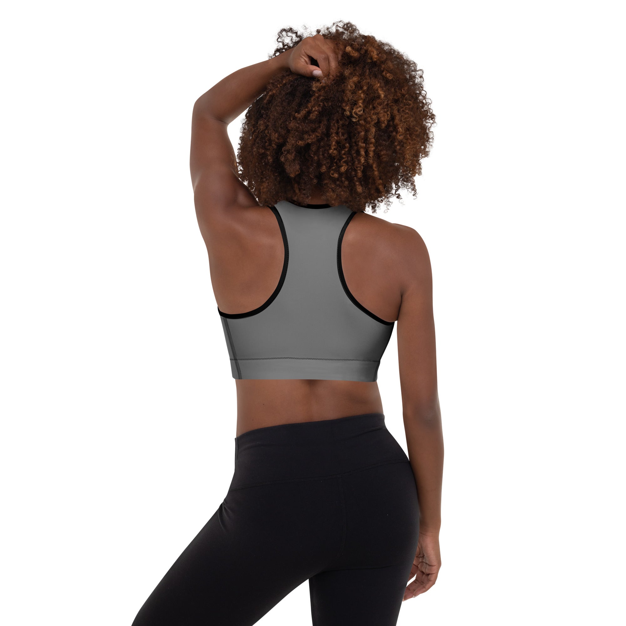 Women’s gray padded sports bra with black trim, racerback design, buttery soft fabric, supportive and quick-dry material