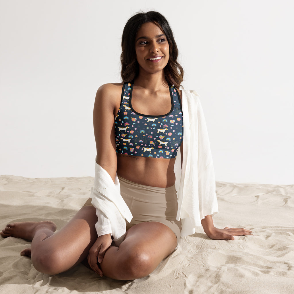 Navy blue padded sports bra with white dachshunds rainbows and colorful paw prints buttery soft quick dry