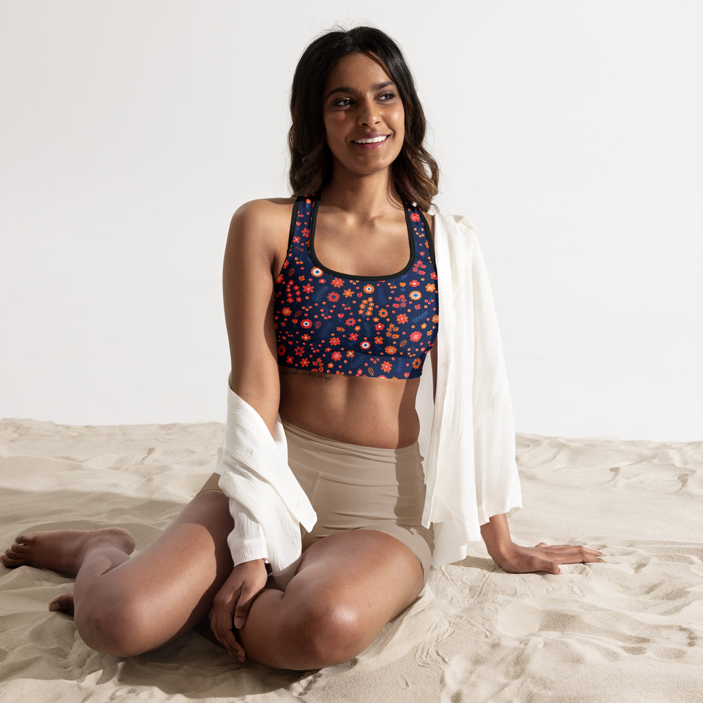 Women’s navy floral padded sports bra with red and orange blossoms buttery soft supportive and quick-dry material