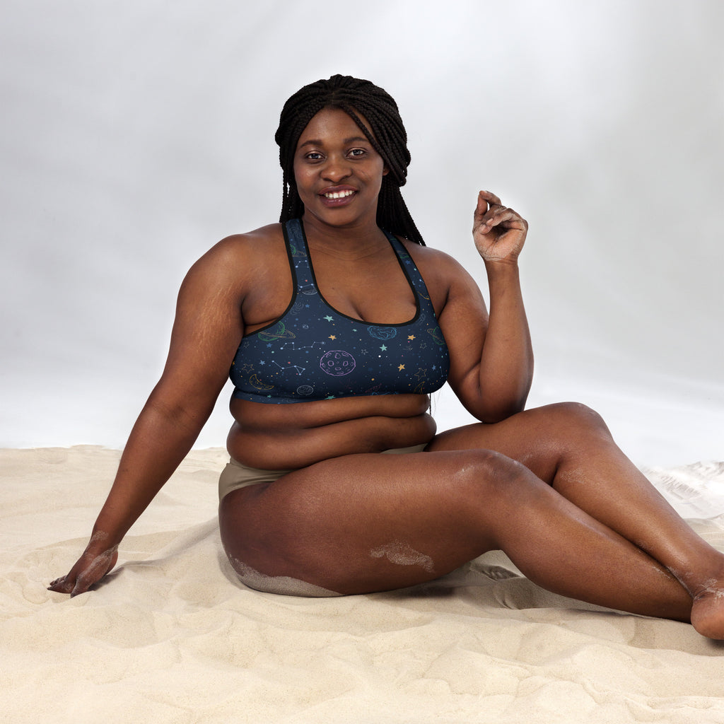 Dark blue women’s padded sports bra with celestial pattern made of buttery soft supportive quick-dry fabric