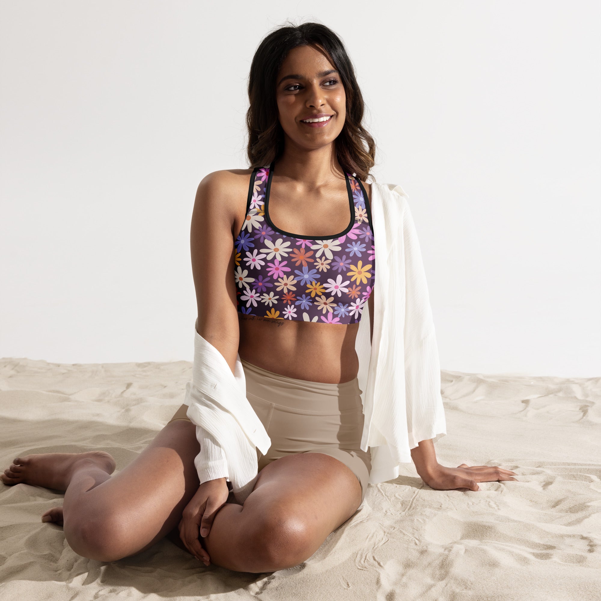 Women’s retro purple daisy padded sports bra with vibrant floral pattern buttery soft supportive and quick dry