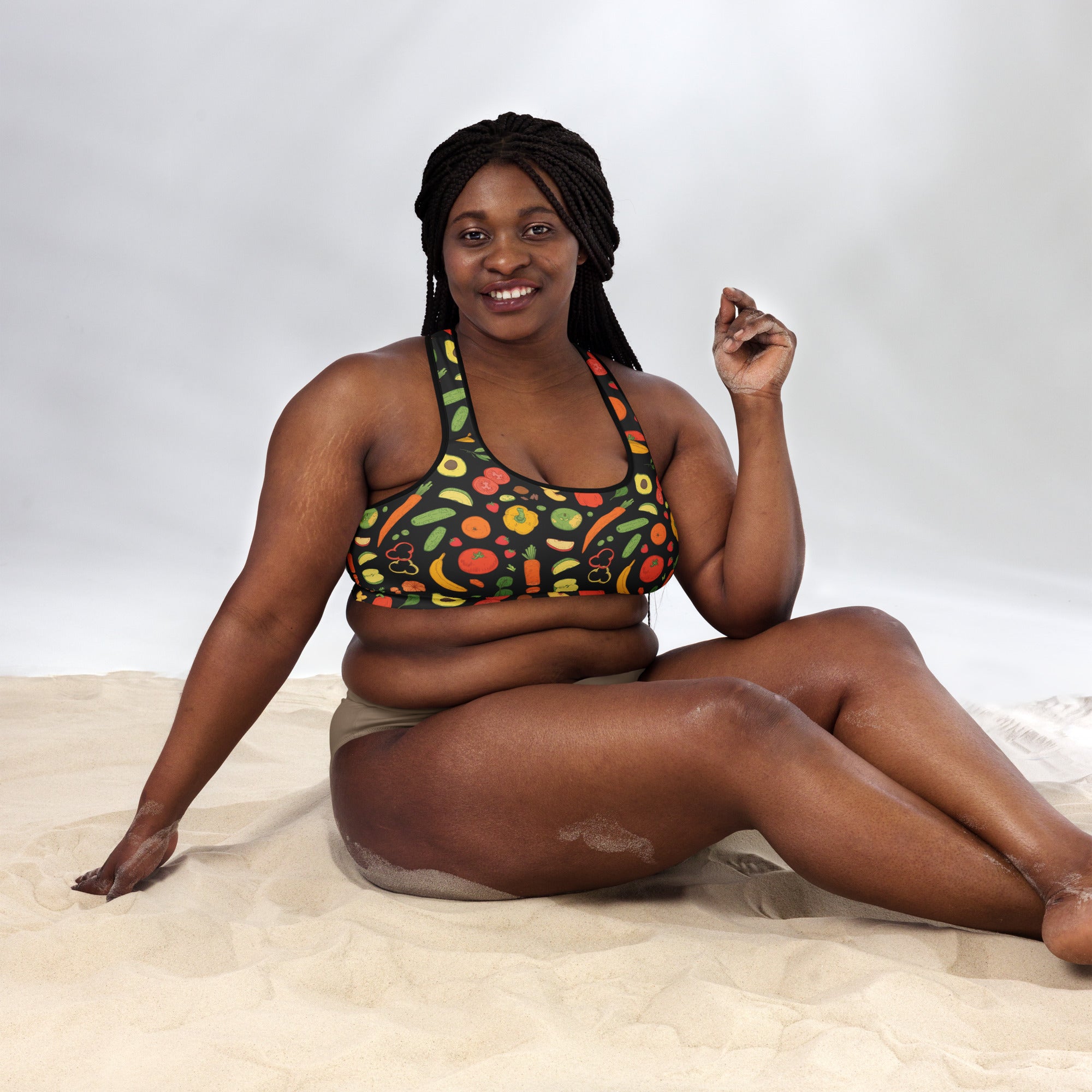Women’s black padded sports bra with vibrant avocado banana and carrot print buttery soft supportive quick dry