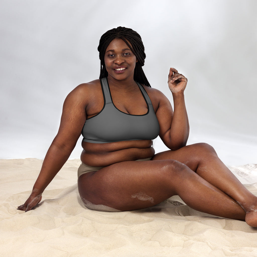 Women’s gray padded sports bra with black trim is buttery soft supportive and quick-dry for active use