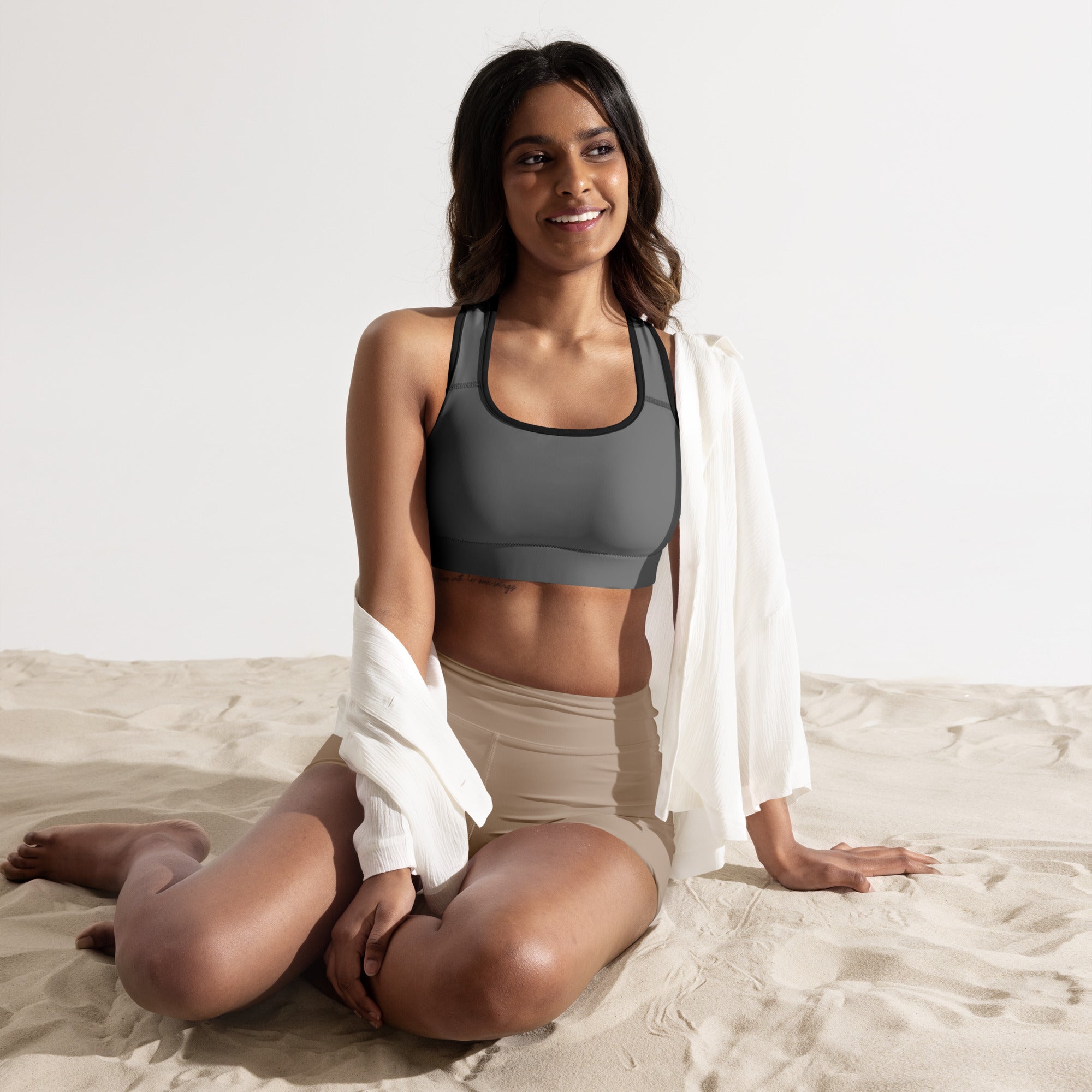 Women’s gray padded sports bra with black trim buttery soft supportive quick-dry fabric for active wear