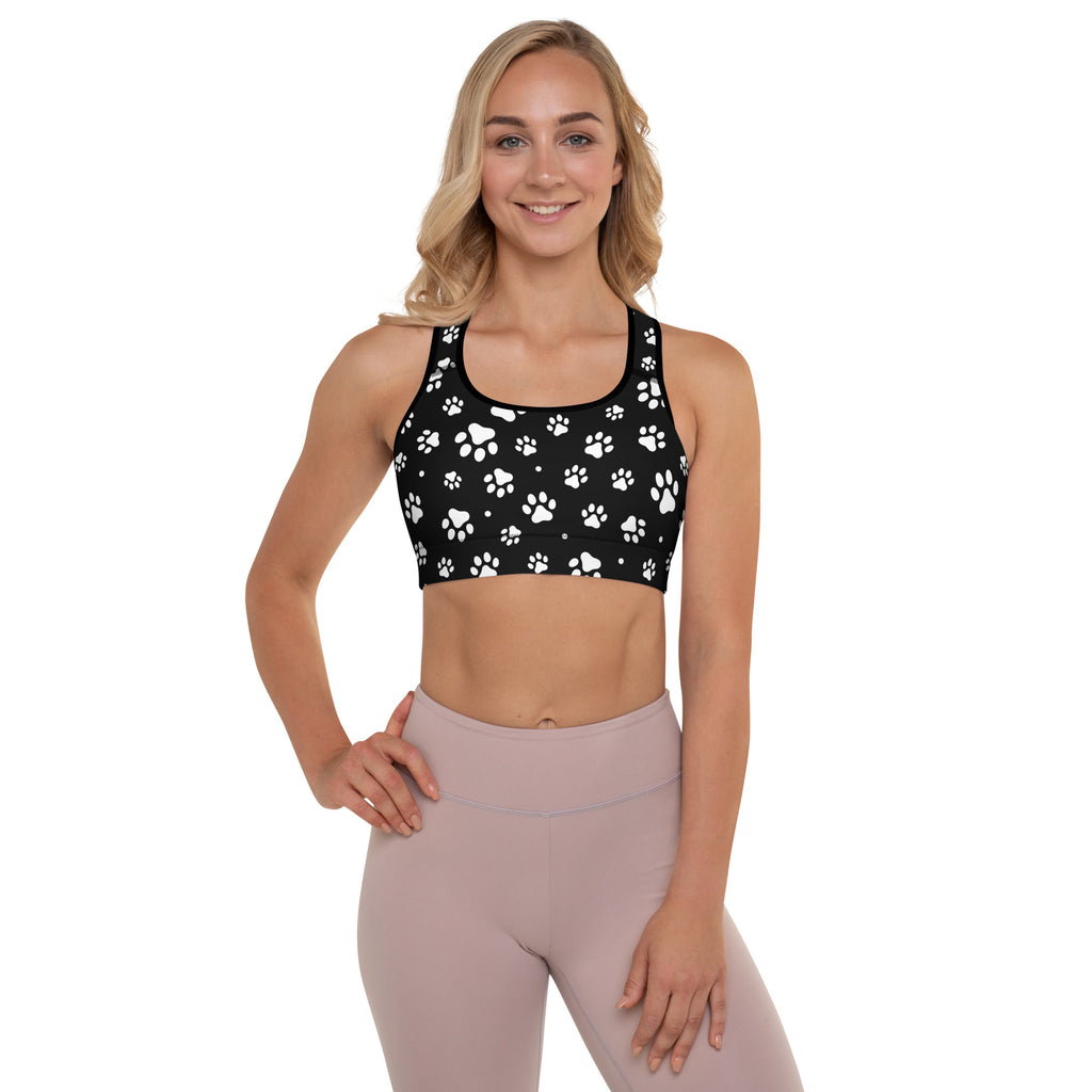 Black women’s padded sports bra with white paw print pattern buttery soft supportive quick-dry fabric