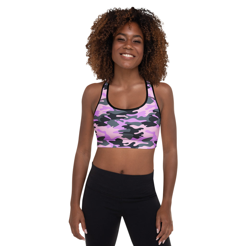 A vibrant purple and black camouflage padded sports bra with a supportive racerback design and quick-dry fabric