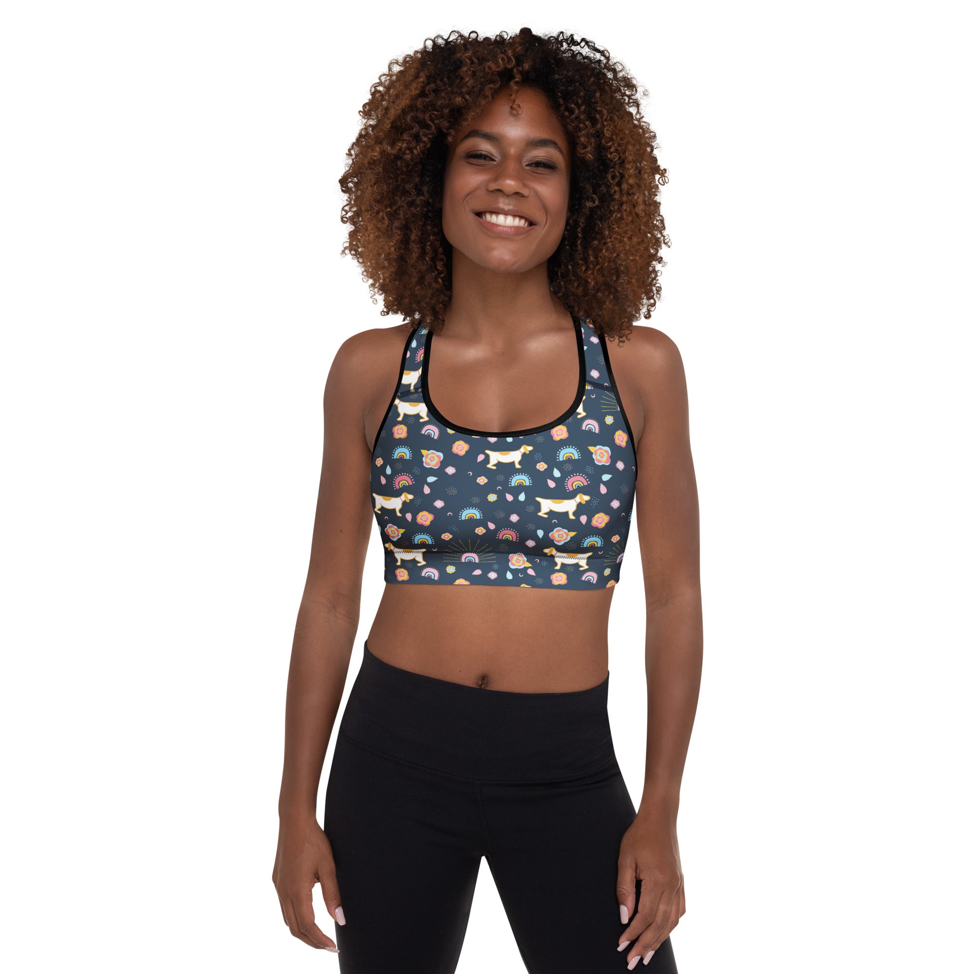 Dark blue women’s padded sports bra with playful white dachshund rainbow and flower print buttery soft quick-dry