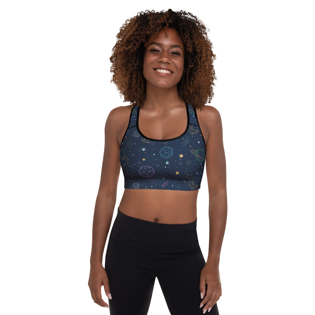 Dark blue space-themed women’s galaxy sports bra with celestial illustrations black trim buttery soft padded design