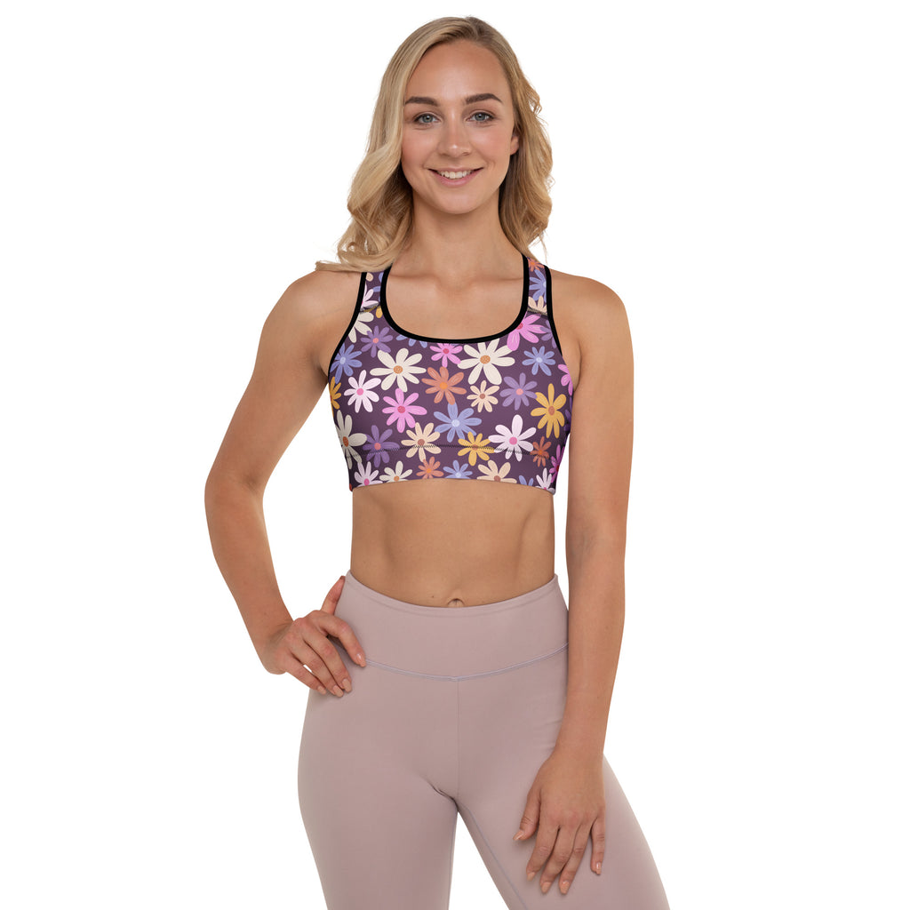 Women’s retro purple daisy padded sports bra with buttery soft fabric, vibrant floral pattern, and quick-dry support