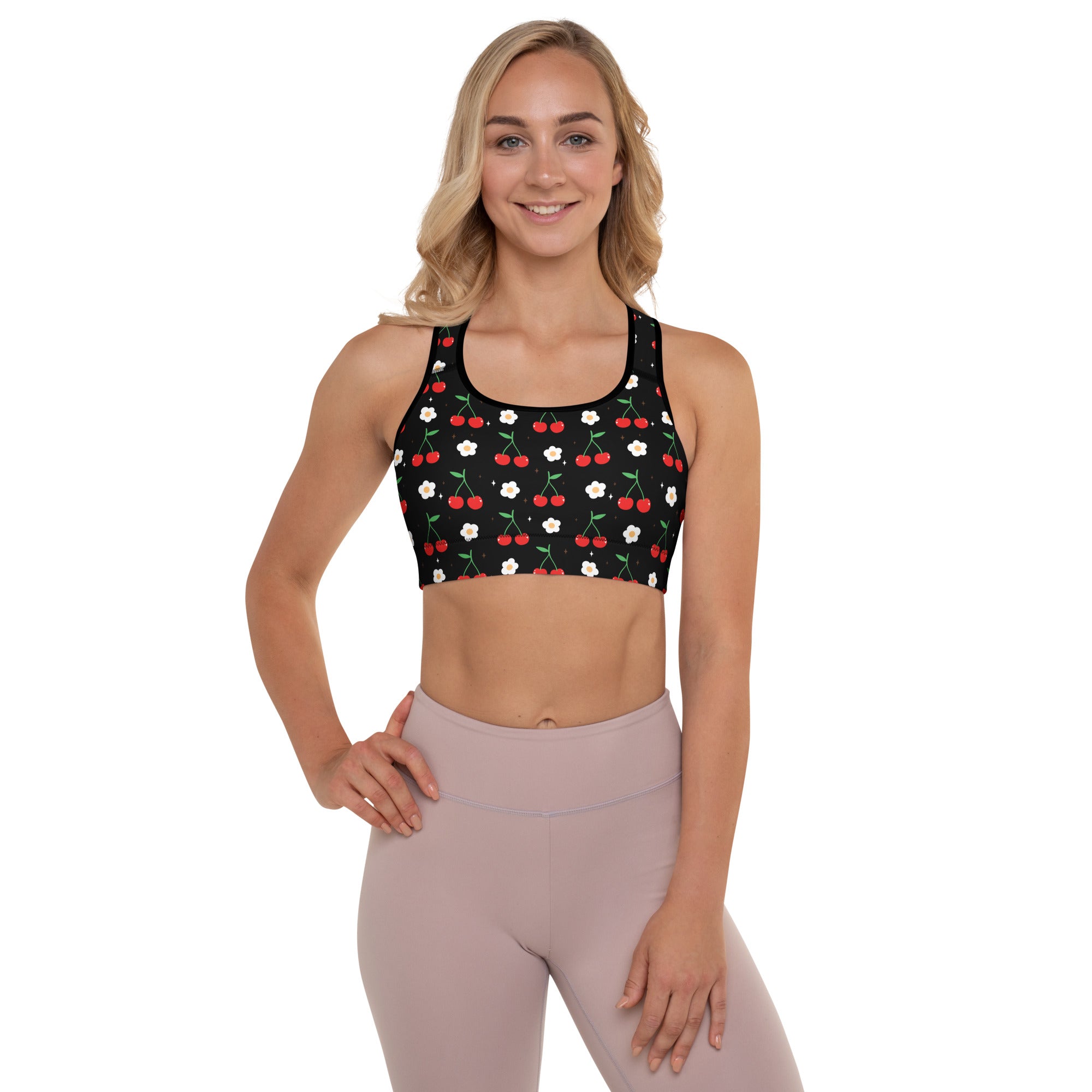 Black padded sports bra with red cherry and white floral pattern buttery soft supportive quick dry fabric
