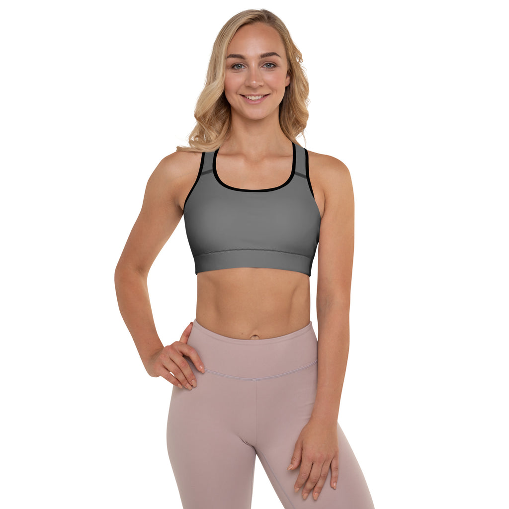Women’s gray padded sports bra with black trim features a supportive seamless design and quick-dry buttery soft fabric