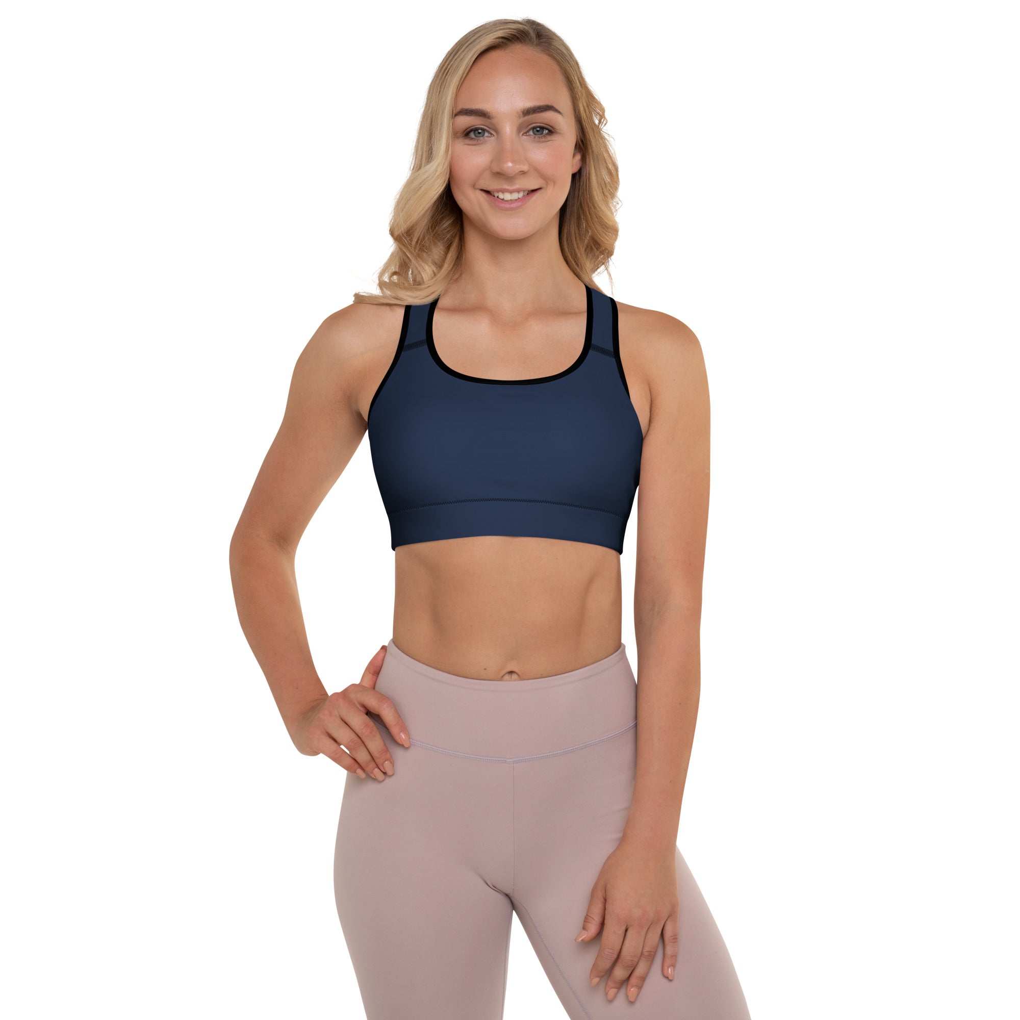 Women’s navy padded sports bra with black trim featuring buttery soft fabric, supportive fit, and quick-dry material