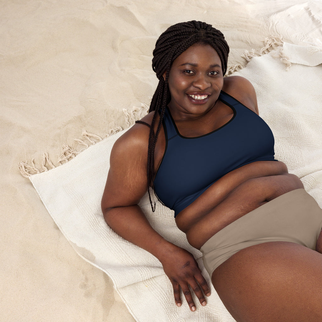 Women’s navy padded sports bra with black trim buttery soft supportive and quick dry fabric for active use
