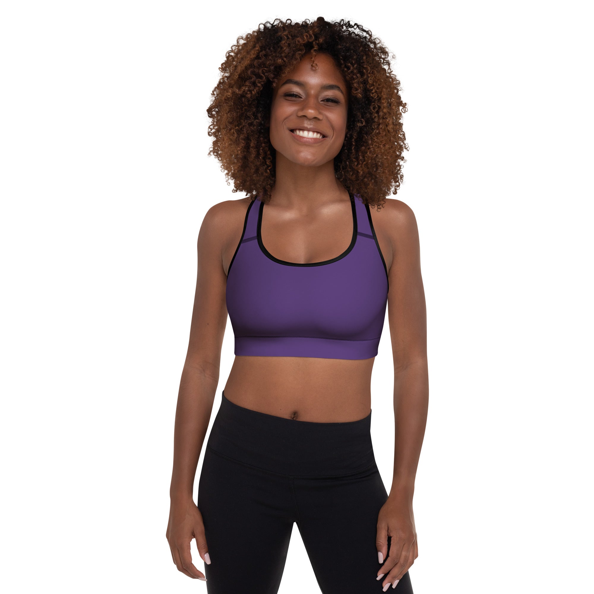 Women’s dark purple padded sports bra with black trim offering buttery soft comfort, support, and quick-dry fabric