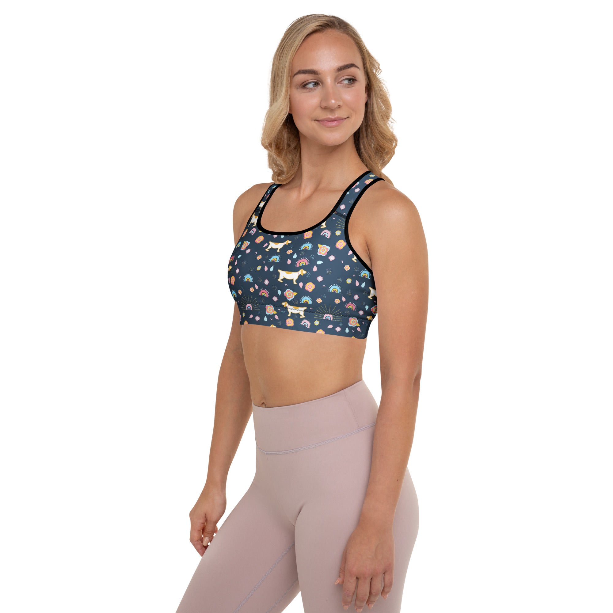 Dark blue women’s dog and rainbow print padded sports bra with black trim buttery soft supportive quick dry