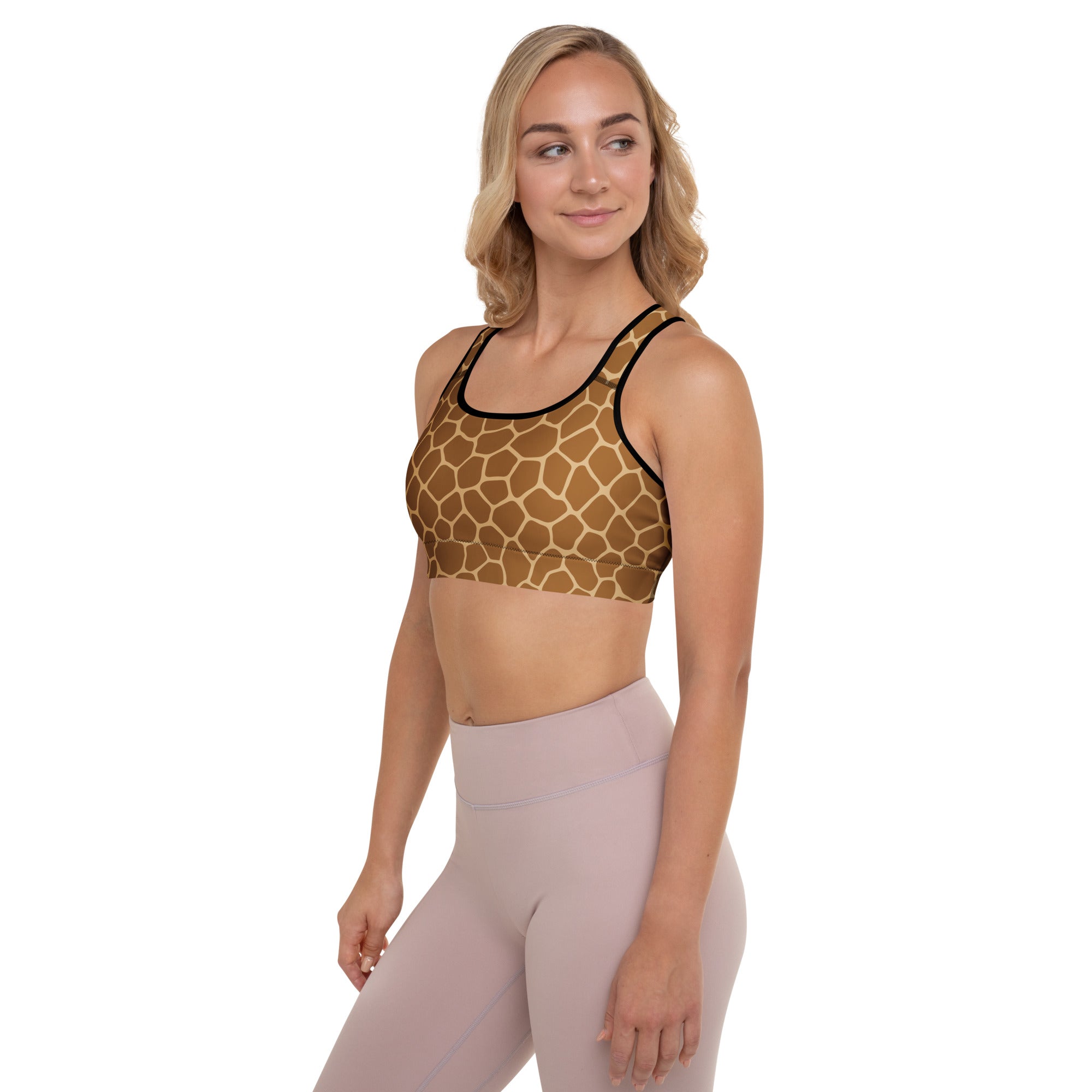 Women’s giraffe print padded sports bra with black trim in buttery soft, supportive, quick-dry, stretchy fabric