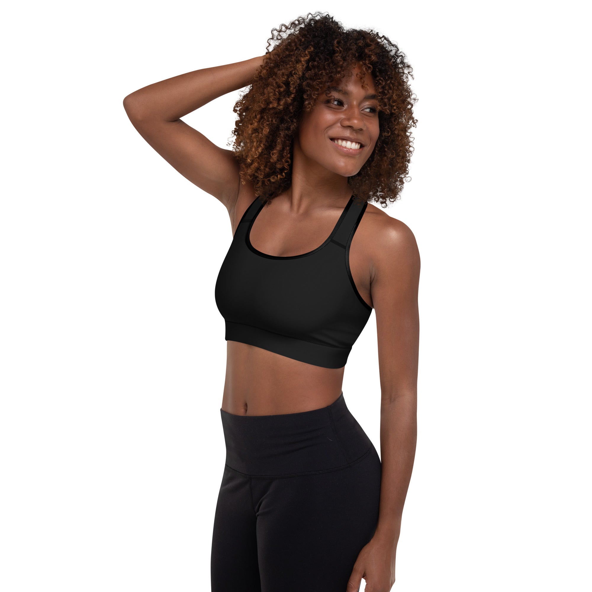 Women’s black padded sports bra with racerback design seamless construction buttery soft supportive quick-dry