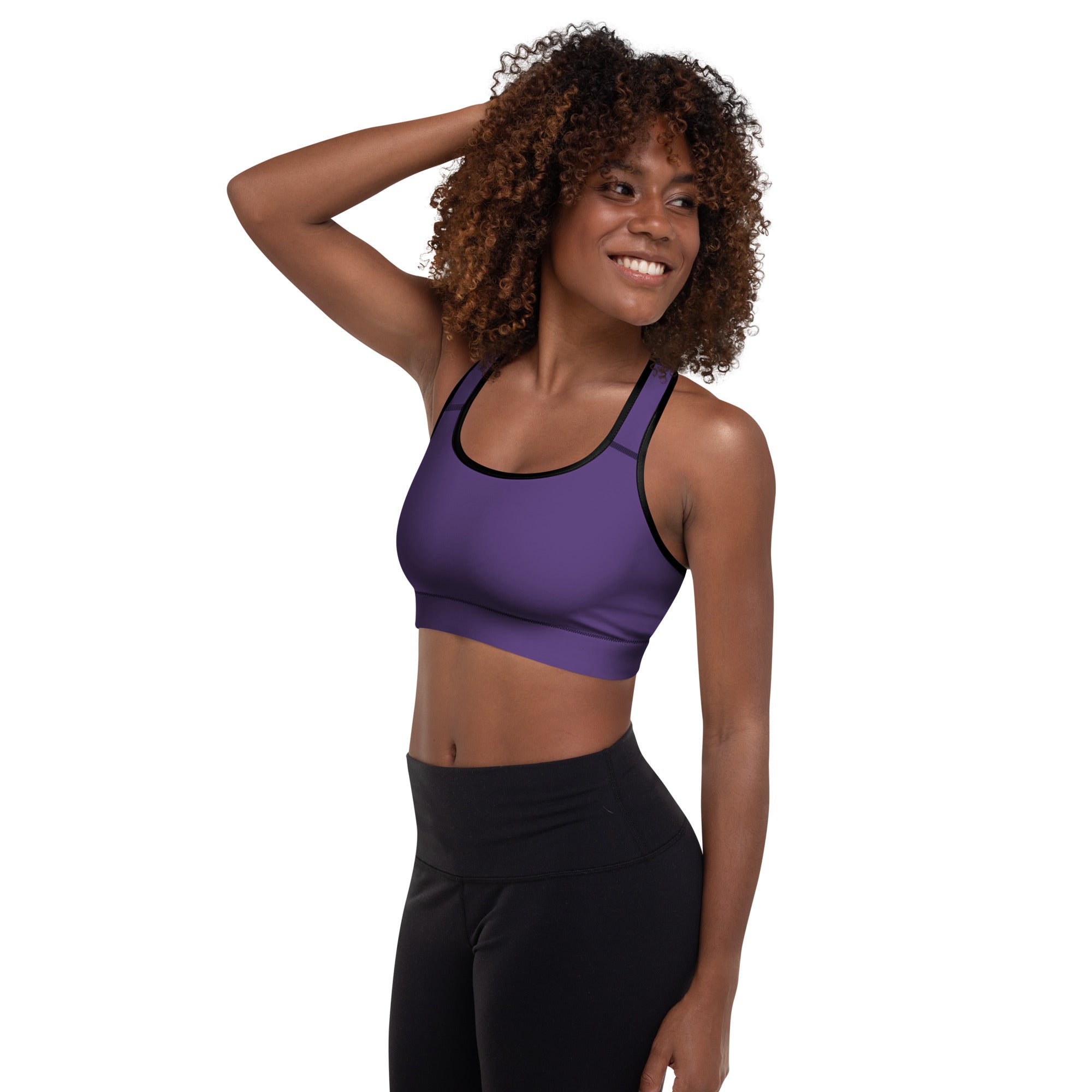 Women’s dark purple padded sports bra with black trim buttery soft supportive and quick-dry fabric visible from front