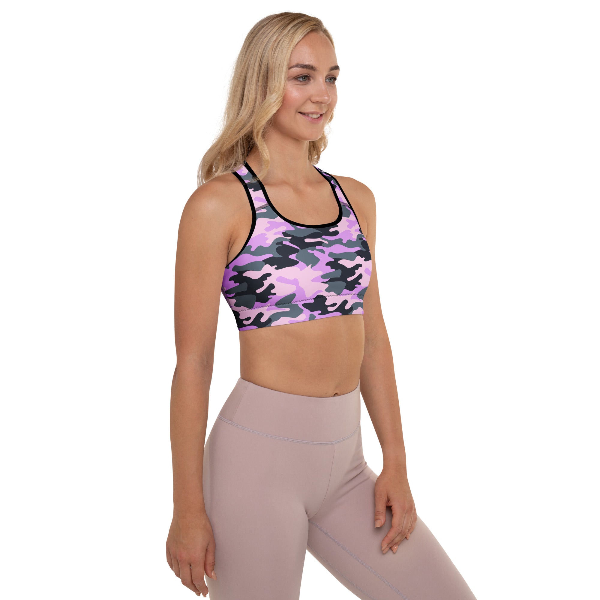 Women’s purple and black camouflage padded sports bra with racerback design, buttery soft, supportive, and quick dry