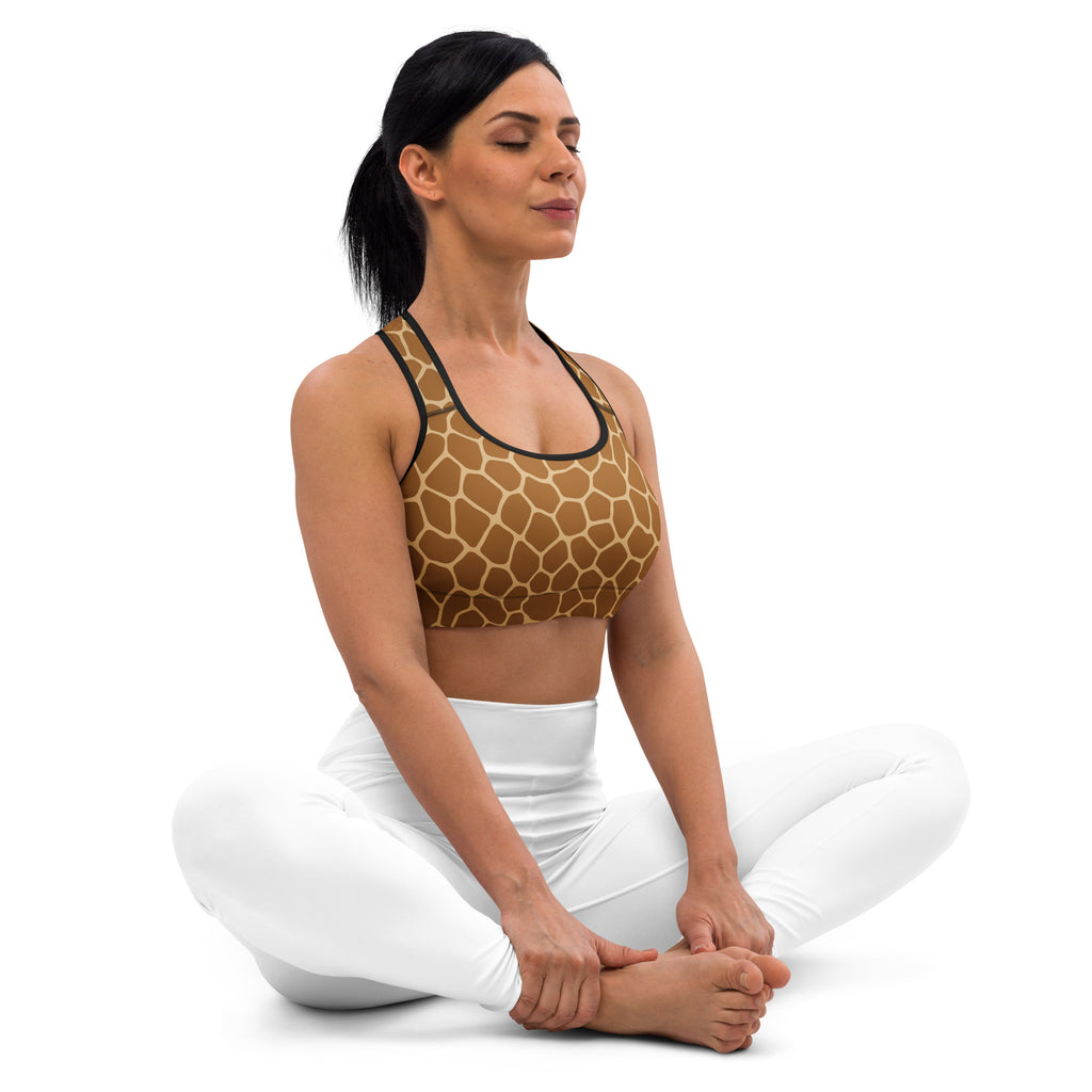 Brown giraffe print padded sports bra with black trim offering buttery soft, supportive, and quick-dry performance