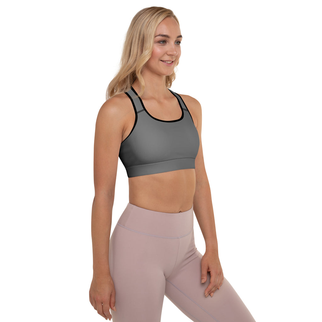 Women’s gray padded sports bra with black trim featuring a buttery soft, supportive, seamless, and quick-dry design