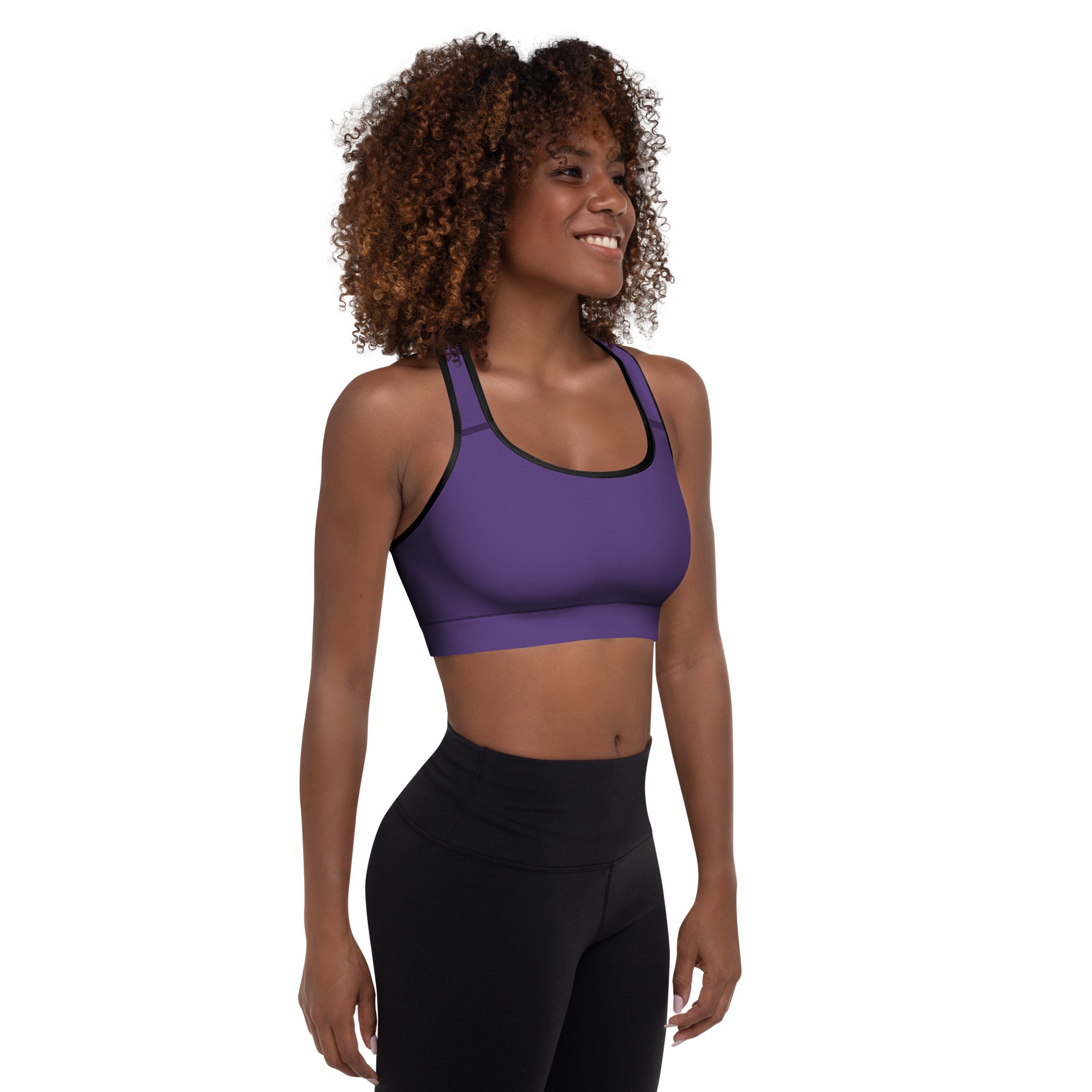 Women’s dark purple padded sports bra with black trim, buttery soft, supportive, and quick-dry fabric for active use