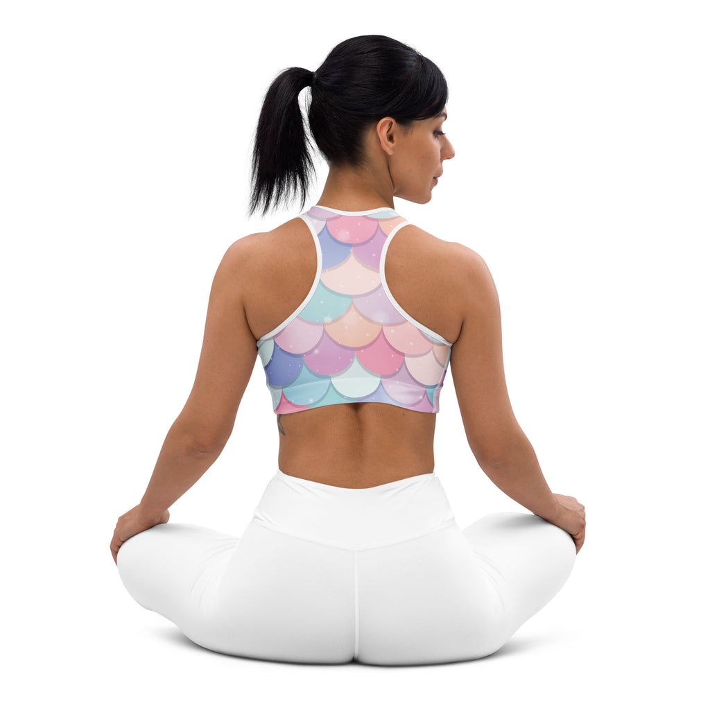 Pastel-colored women’s rainbow mermaid padded sports bra with white trim, buttery soft, supportive, and quick-dry material