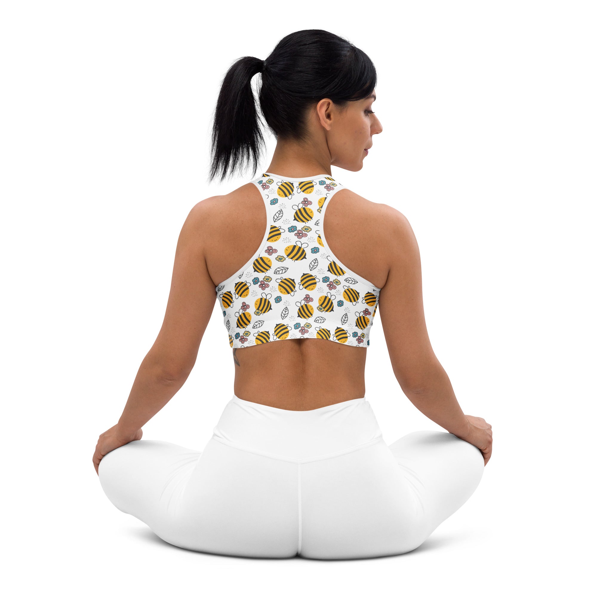 White padded sports bra with yellow and black bumblebee pattern buttery soft supportive quick-dry material