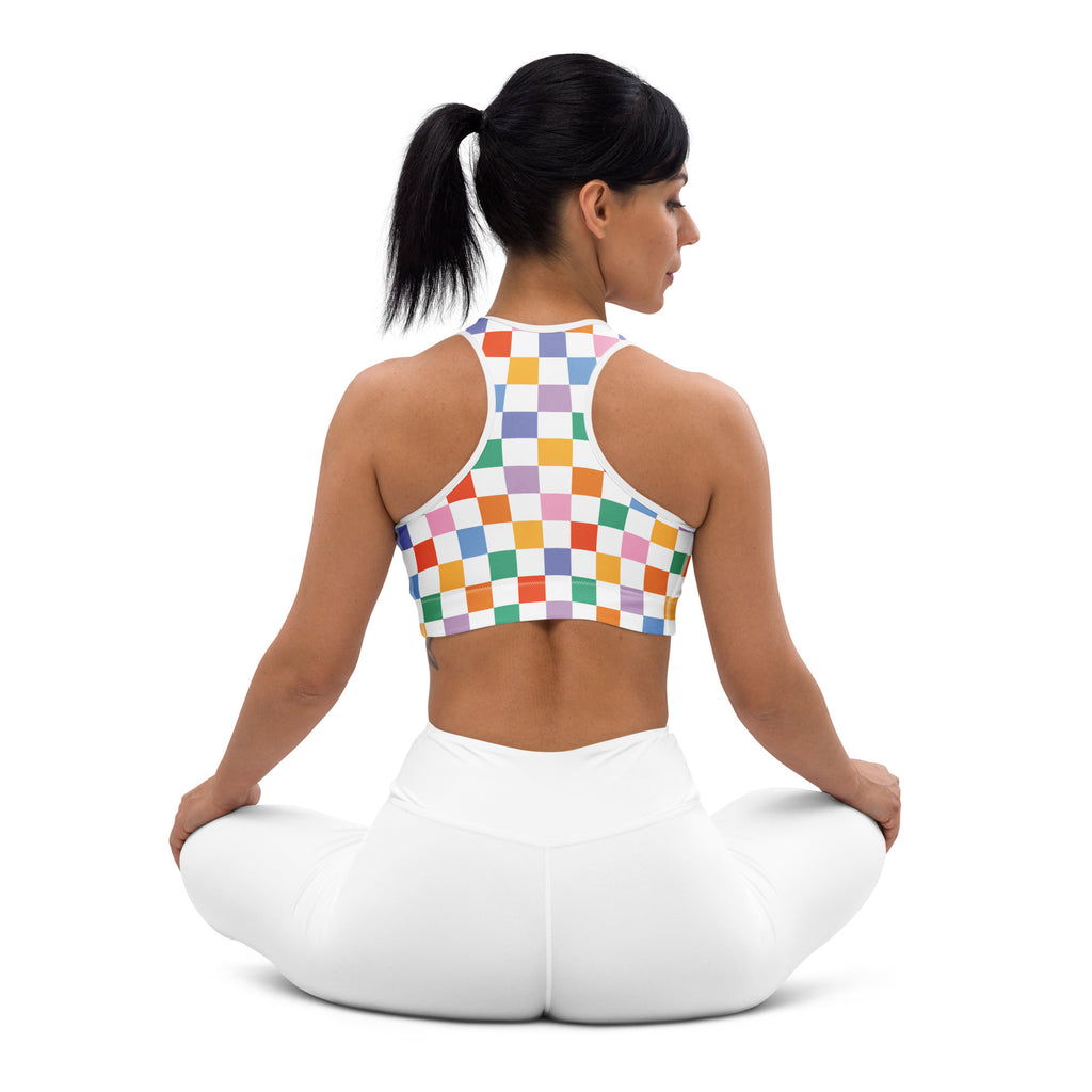 Women’s colorful checkerboard padded sports bra with white racerback and high-waisted matching leggings in buttery soft quick-dry fabric
