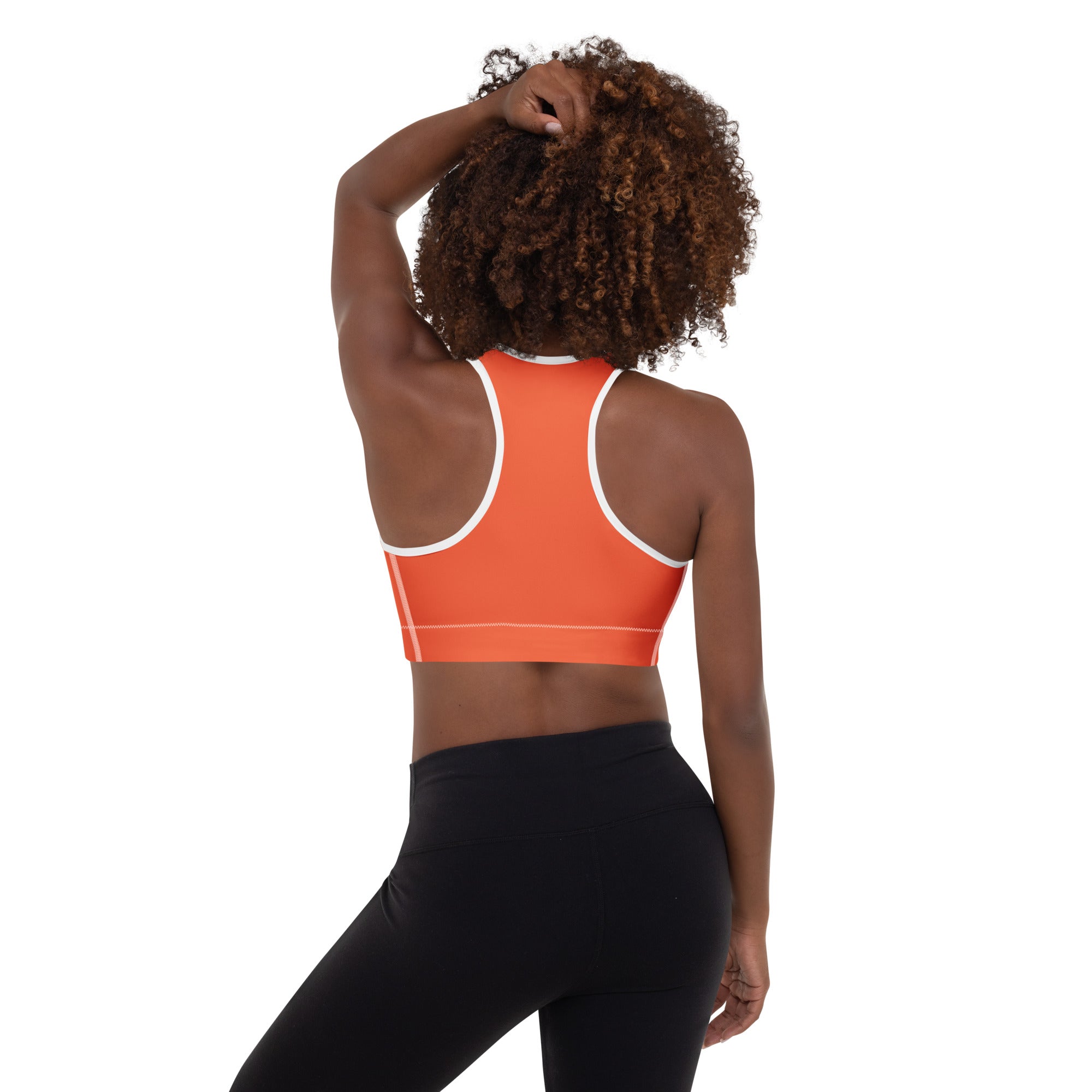Women’s orange padded sports bra with white trim and side stripes buttery soft supportive quick-dry material