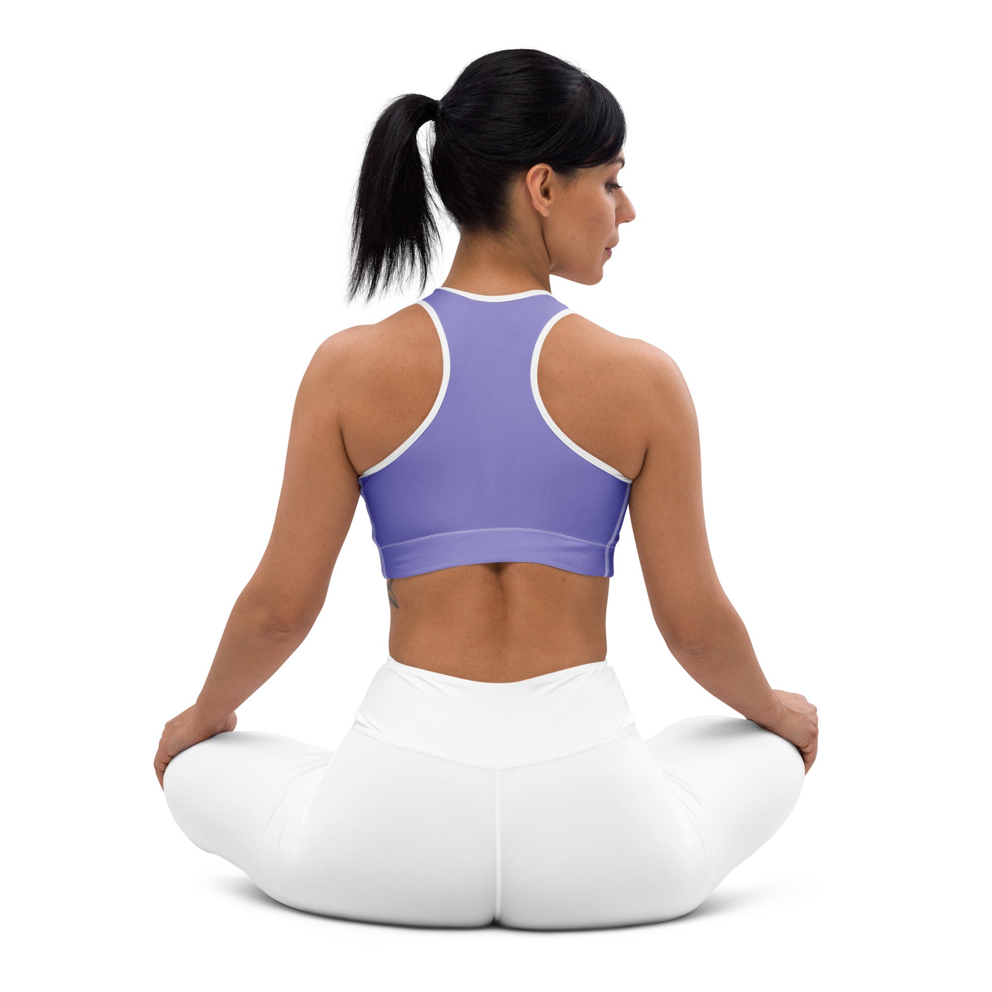 Women’s purple padded sports bra with white trim made of buttery soft supportive quick-dry fabric