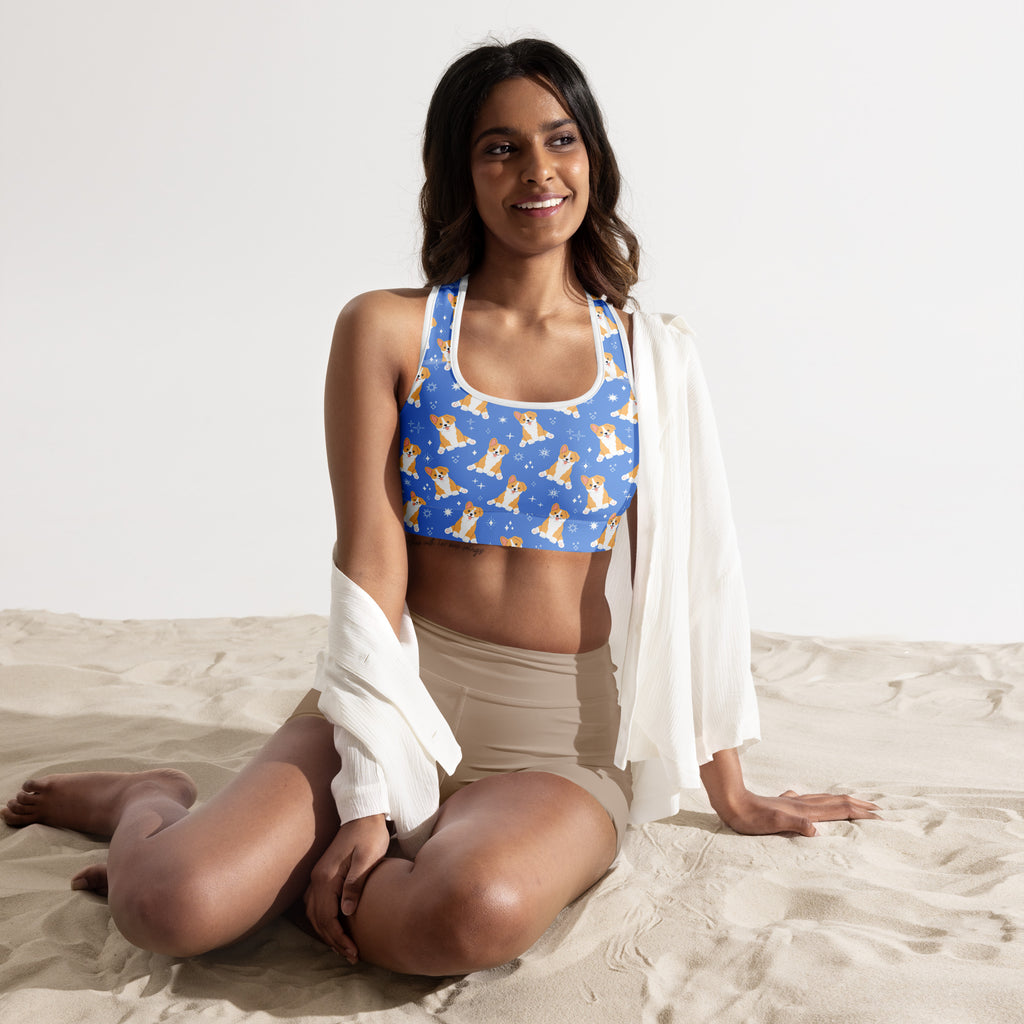Women’s blue corgi dog padded sports bra with playful tan corgi pattern on starry background buttery soft quick dry