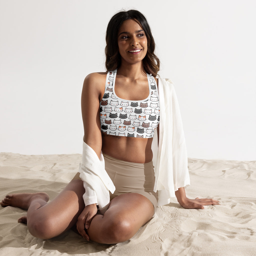 White women’s cat padded sports bra with multicolored cat faces in black gray and pink buttery soft quick-dry fabric