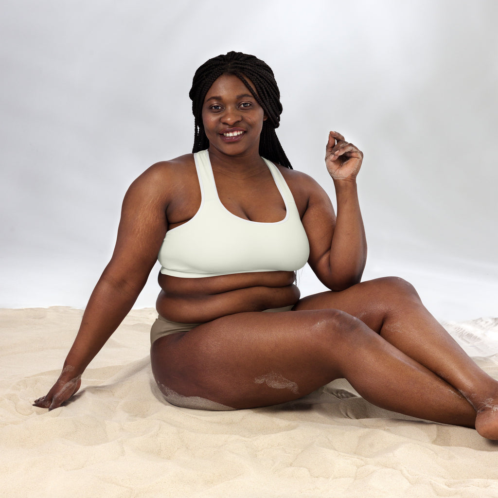 White sports bra with simple racerback design featuring buttery soft padded quick-dry fabric for women