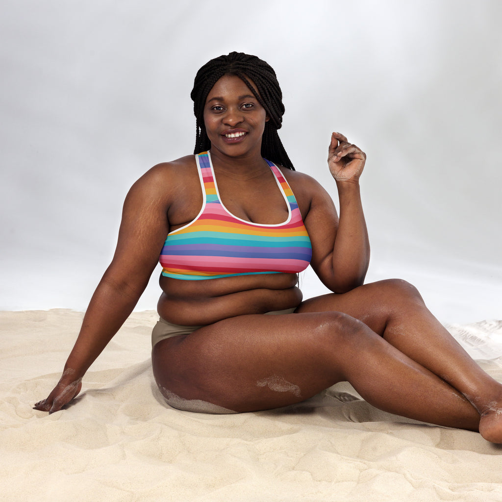 Women’s bright striped rainbow padded sports bra with white trim buttery soft supportive and quick dry fabric
