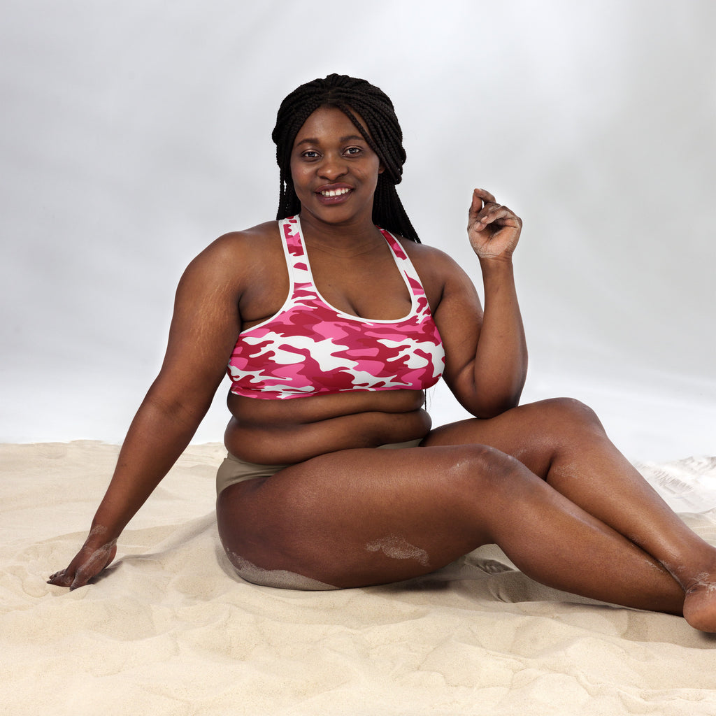 Women’s vibrant pink and white camouflage padded sports bra with buttery soft fabric and supportive quick-dry design