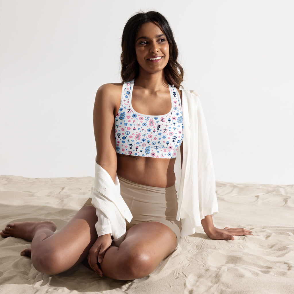 White womens floral print padded sports bra with buttery soft fabric and quick dry colorful pink blue and green pattern