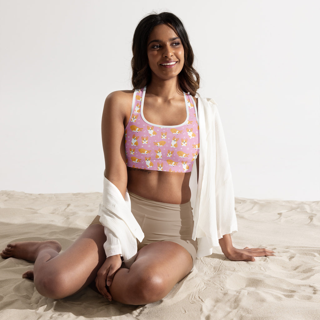 Women’s pink corgi dog padded sports bra with white trim featuring a buttery soft supportive quick-dry fabric