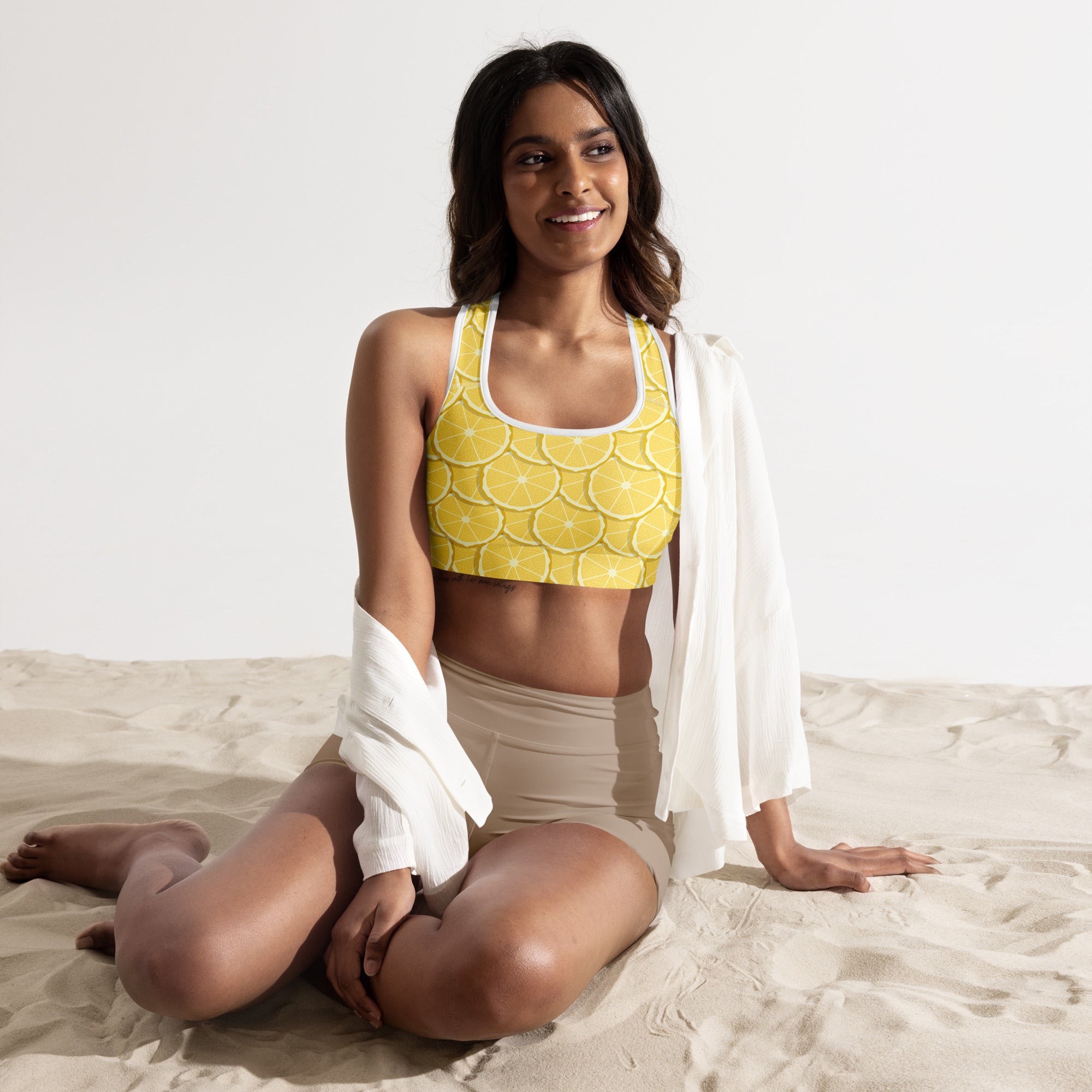 Women’s lemon slice print padded sports bra in yellow with white trim, buttery soft, supportive, and quick-dry