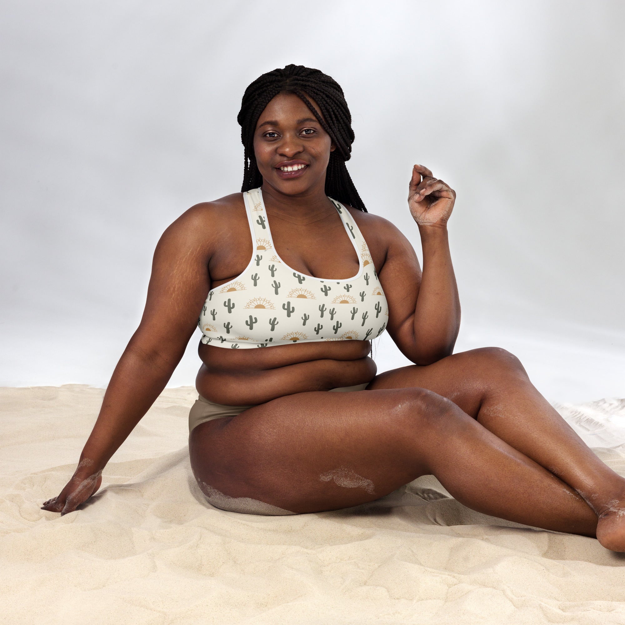 White padded sports bra with black cactus and sun motifs buttery soft supportive quick-dry fabric