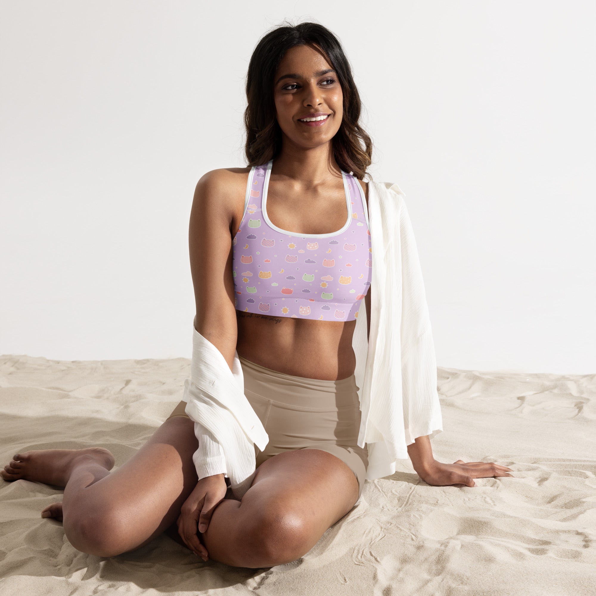 Lavender padded sports bra with pastel-colored cupcake pattern buttery soft supportive and quick-dry fabric
