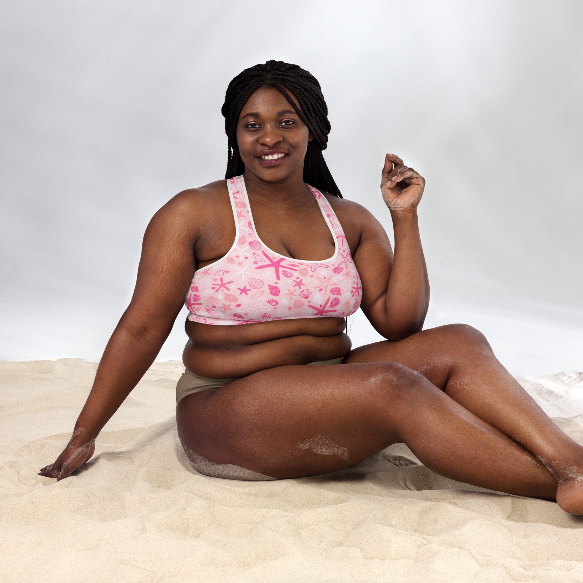 Women’s pink starfish and shells padded sports bra with buttery soft fabric supportive fit and quick-dry material