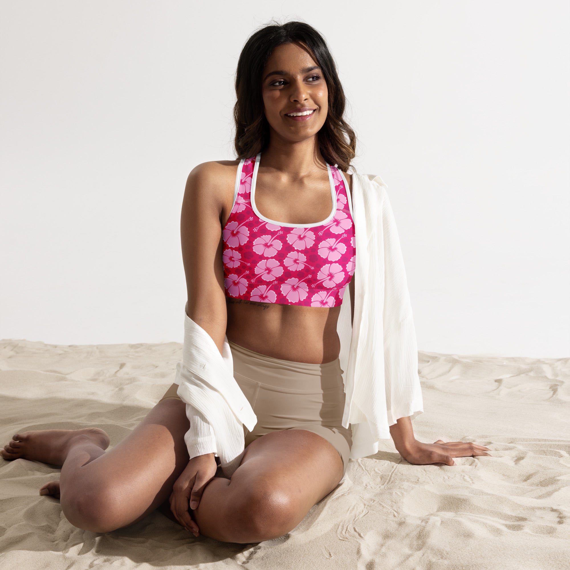 Women’s pink hibiscus floral padded sports bra with white trim butter soft supportive and quick dry material