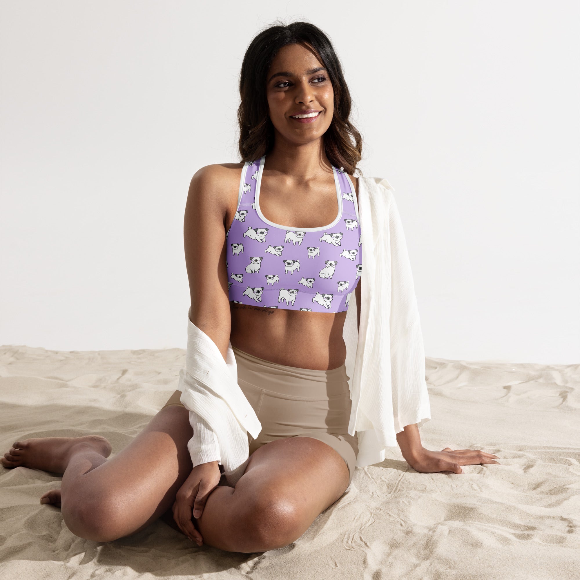 Women’s purple pug padded sports bra with a playful white pug pattern buttery soft supportive and quick-dry